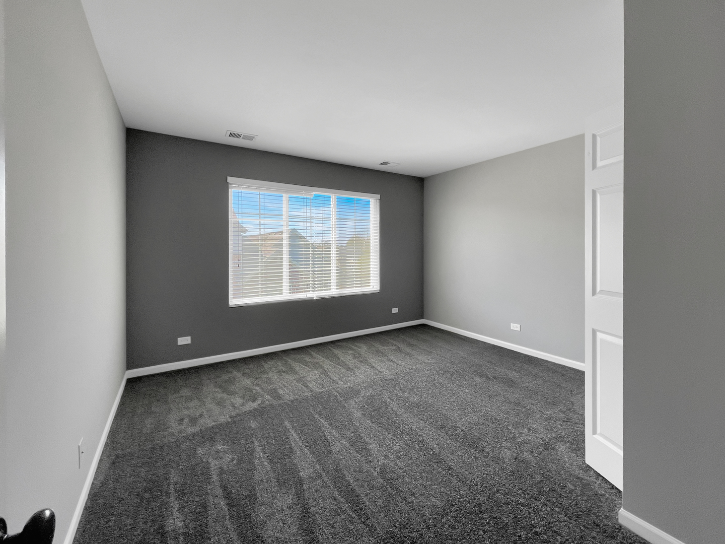 3414 Cameron Drive Elgin, IL 60124 - Photo 18 of 24 a view of an empty room with a window