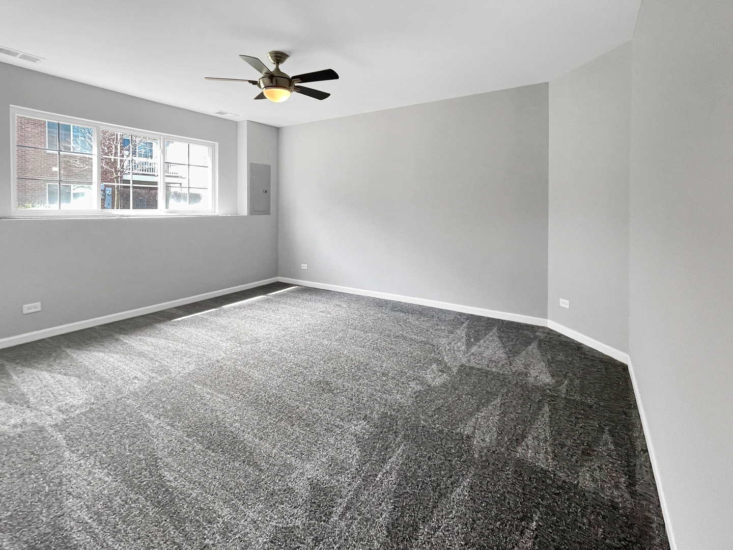 3414 Cameron Drive Elgin, IL 60124 - Photo 21 of 24 a view of an empty room with a window