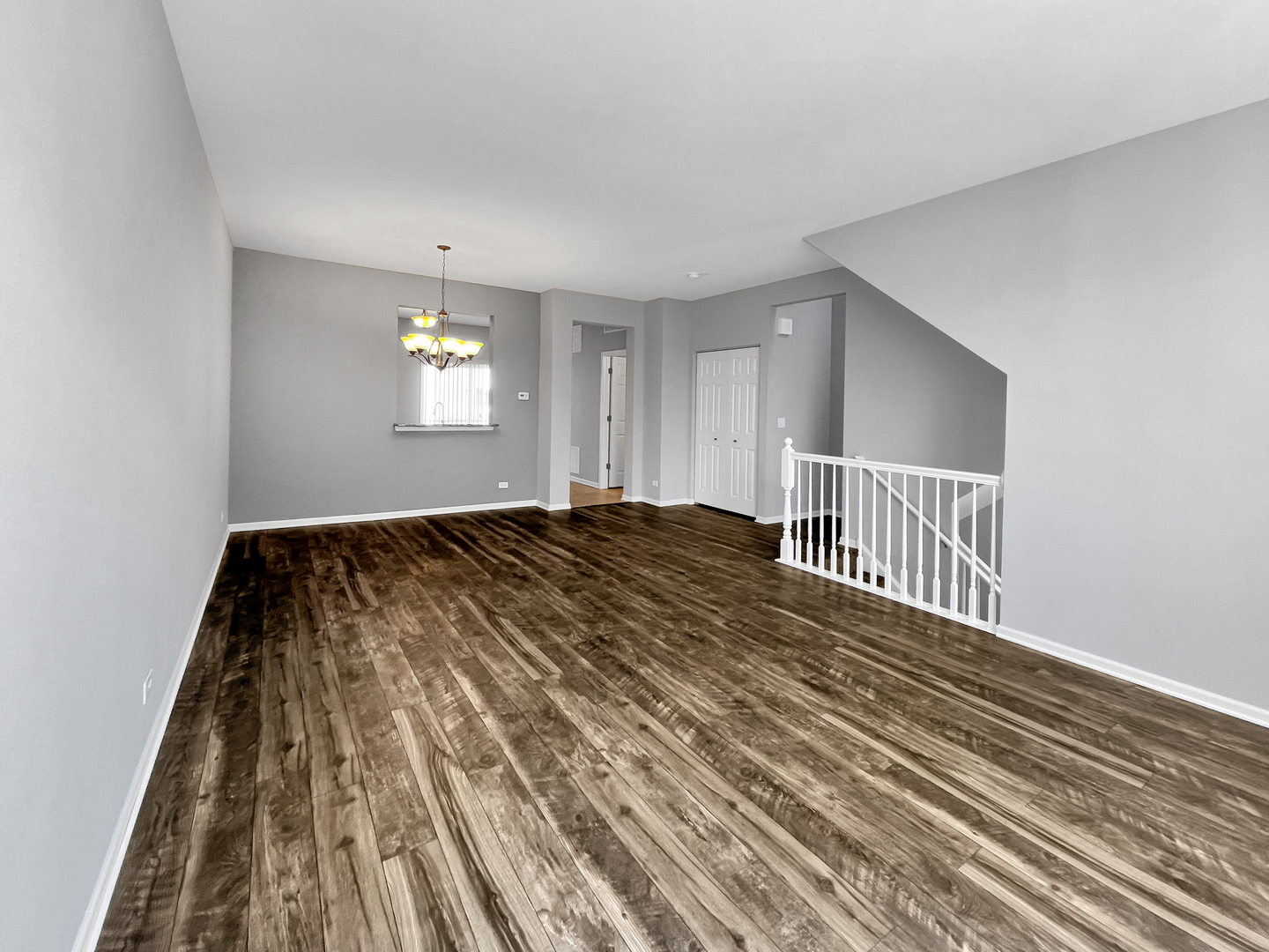 3414 Cameron Drive Elgin, IL 60124 - Photo 4 of 24 a view of a hallway with wooden floor