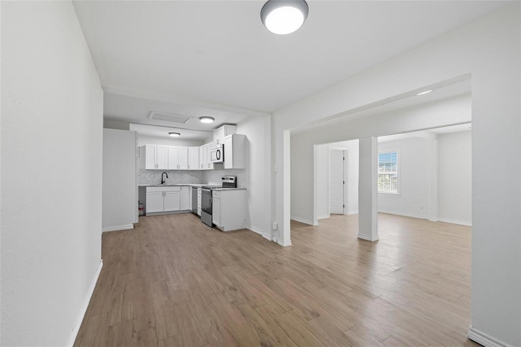 622 South Charles Street, Unit 622 Sherman, TX 75090 - Photo 20 of 21 a view of a kitchen with wooden floor