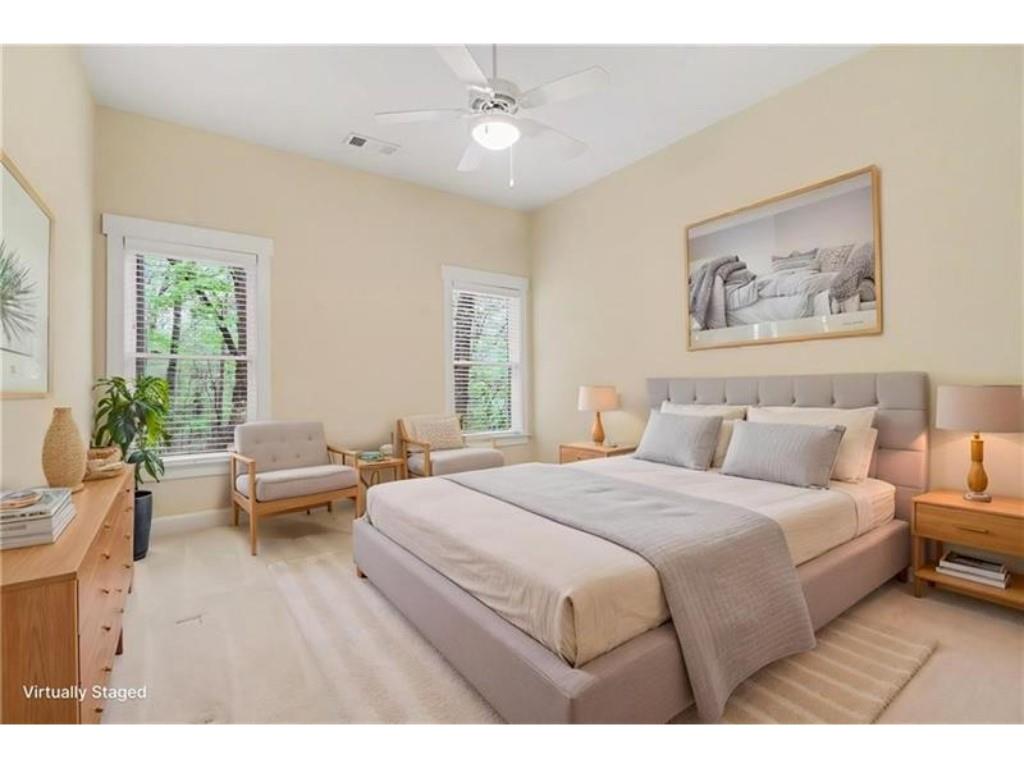 53 Pinto Place Jasper, GA 30143 - Photo 35 of 62 a bedroom with a large bed and a chandelier