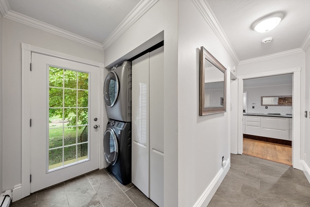 176 Spring Street Hopkinton, MA 01748 - Photo 14 of 42 a view of hallway with washer and dryer
