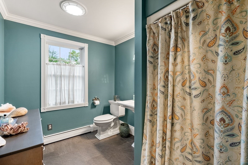 176 Spring Street Hopkinton, MA 01748 - Photo 15 of 42 a bathroom with a sink toilet and shower