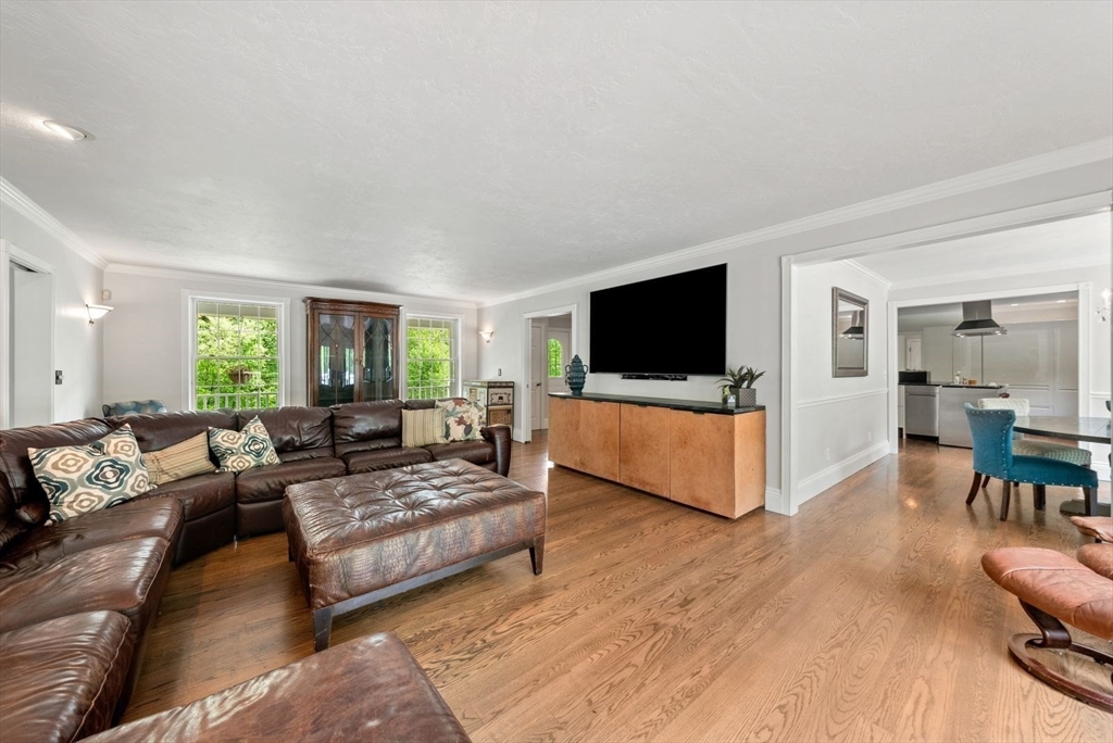 176 Spring Street Hopkinton, MA 01748 - Photo 19 of 42 a living room with furniture and a flat screen tv