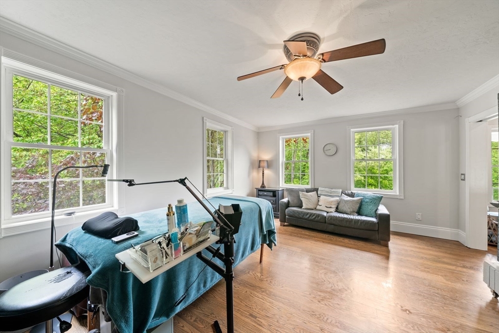 176 Spring Street Hopkinton, MA 01748 - Photo 23 of 42 a living room with furniture and a large window