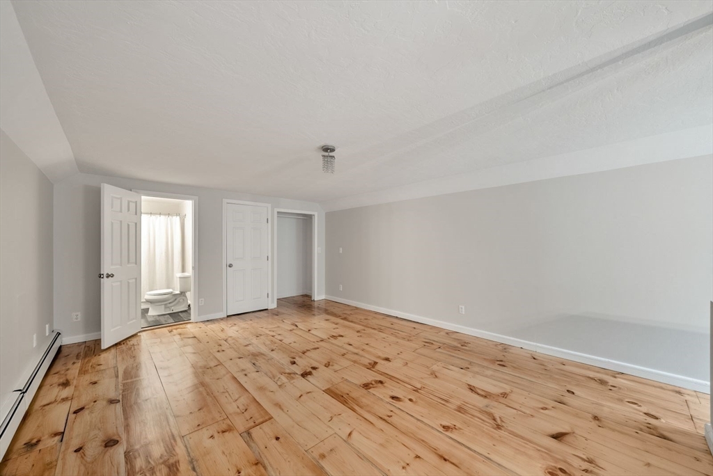 176 Spring Street Hopkinton, MA 01748 - Photo 32 of 42 a view of an empty room and window