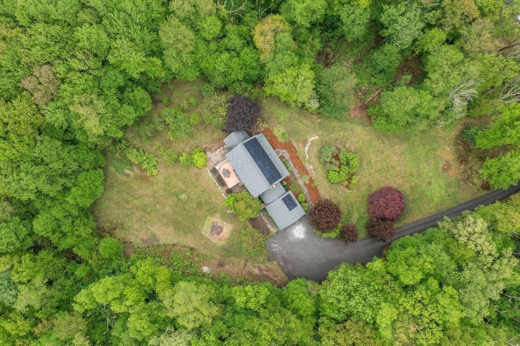 176 Spring Street Hopkinton, MA 01748 - Photo 35 of 42 an aerial view of a house with outdoor space and a lake view