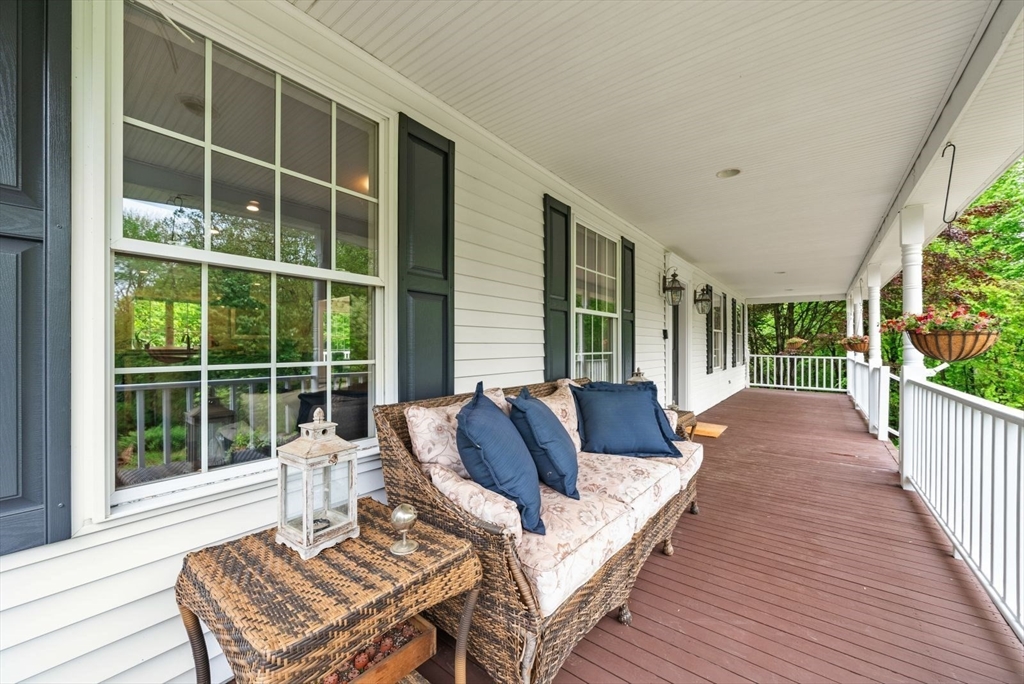 176 Spring Street Hopkinton, MA 01748 - Photo 5 of 42 a living room with furniture and a large window