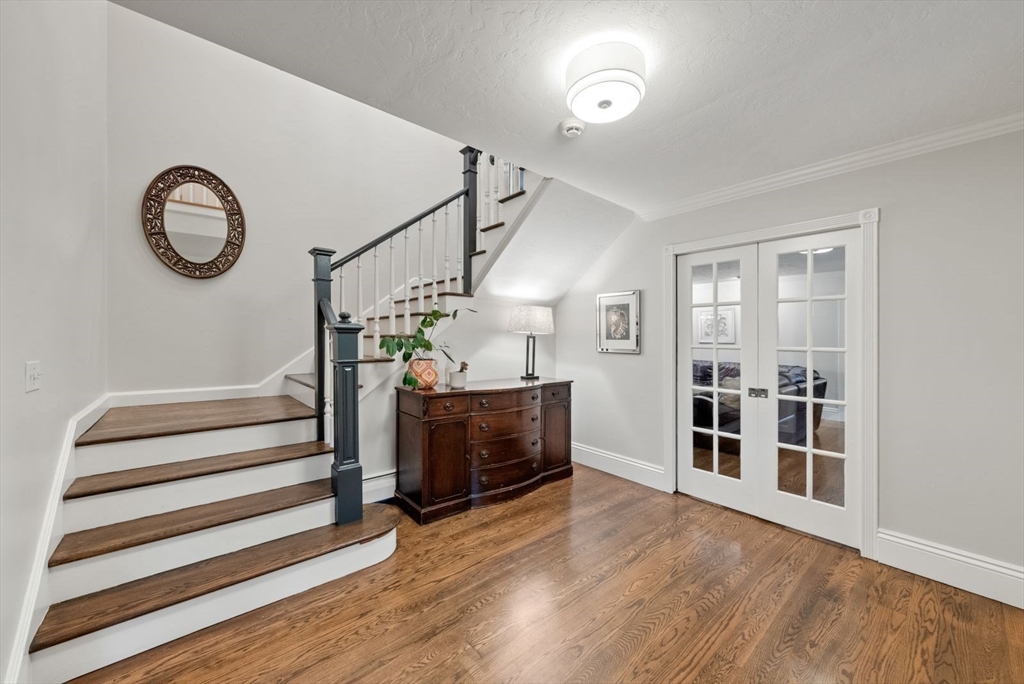 176 Spring Street Hopkinton, MA 01748 - Photo 6 of 42 a view of a livingroom with furniture wooden floor and window