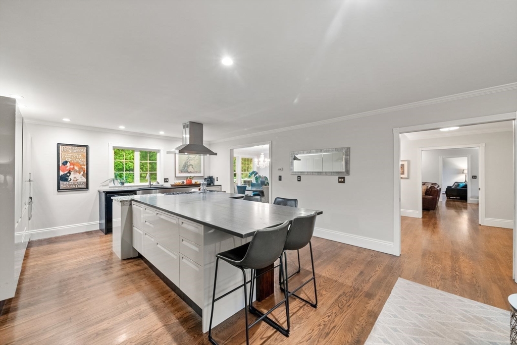 176 Spring Street Hopkinton, MA 01748 - Photo 9 of 42 a kitchen with counter top space and painting on the wall