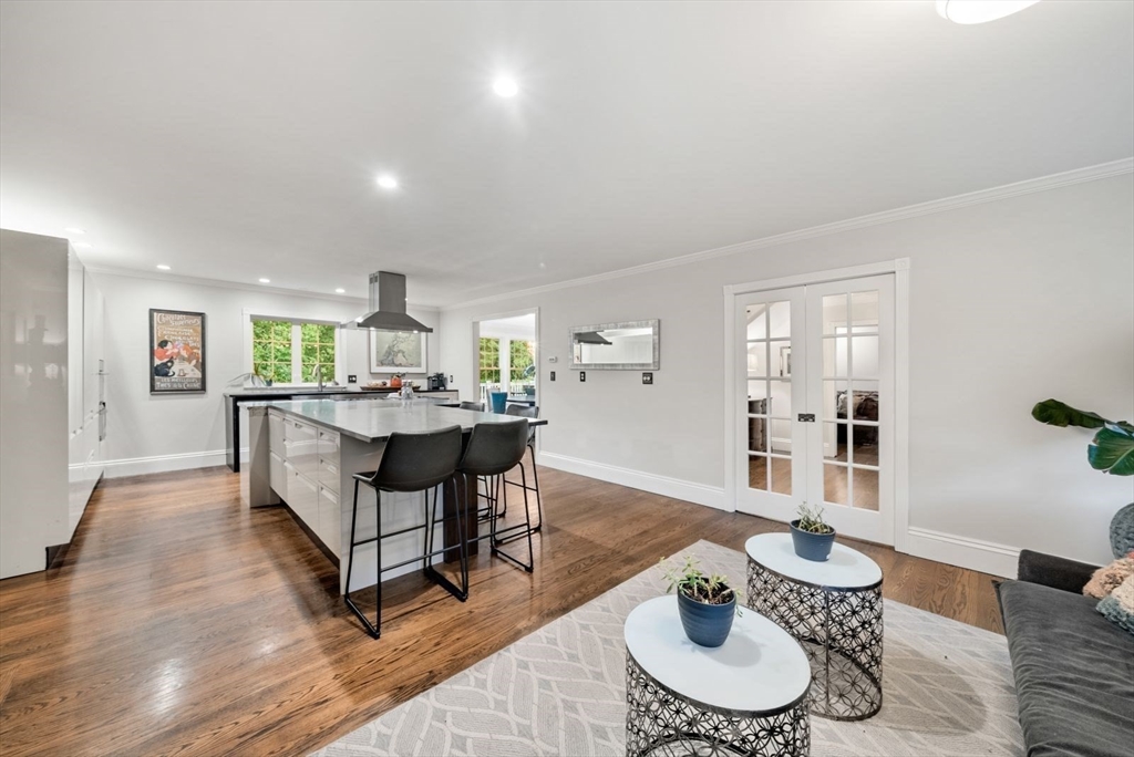 176 Spring Street Hopkinton, MA 01748 - Photo 10 of 42 a living room with furniture and a wooden floor