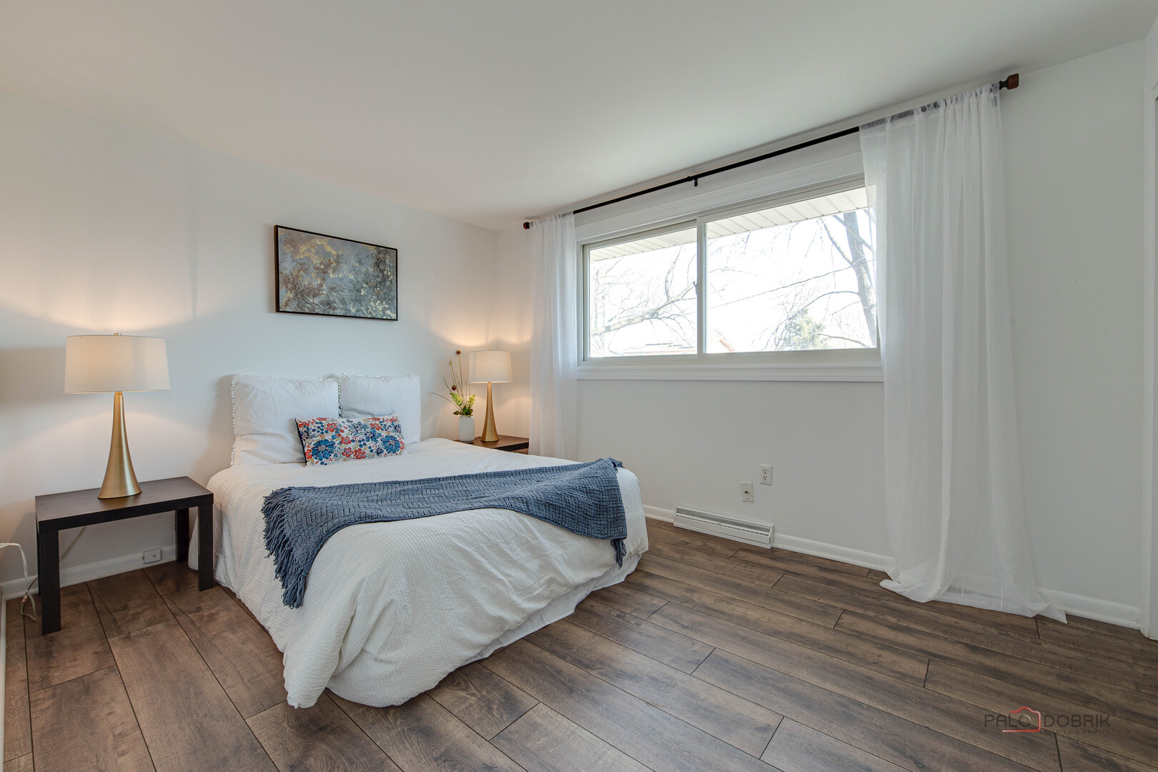 73 South Beck Road Lindenhurst, IL 60046 - Photo 11 of 23 a bedroom with a bed and a window