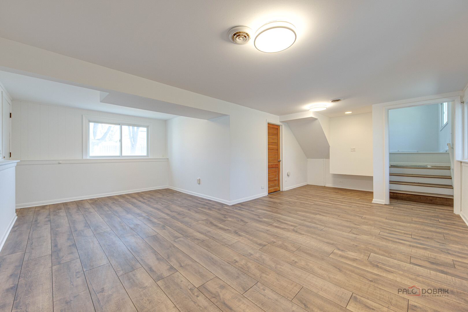 73 South Beck Road Lindenhurst, IL 60046 - Photo 15 of 23 a view of empty room with wooden floor