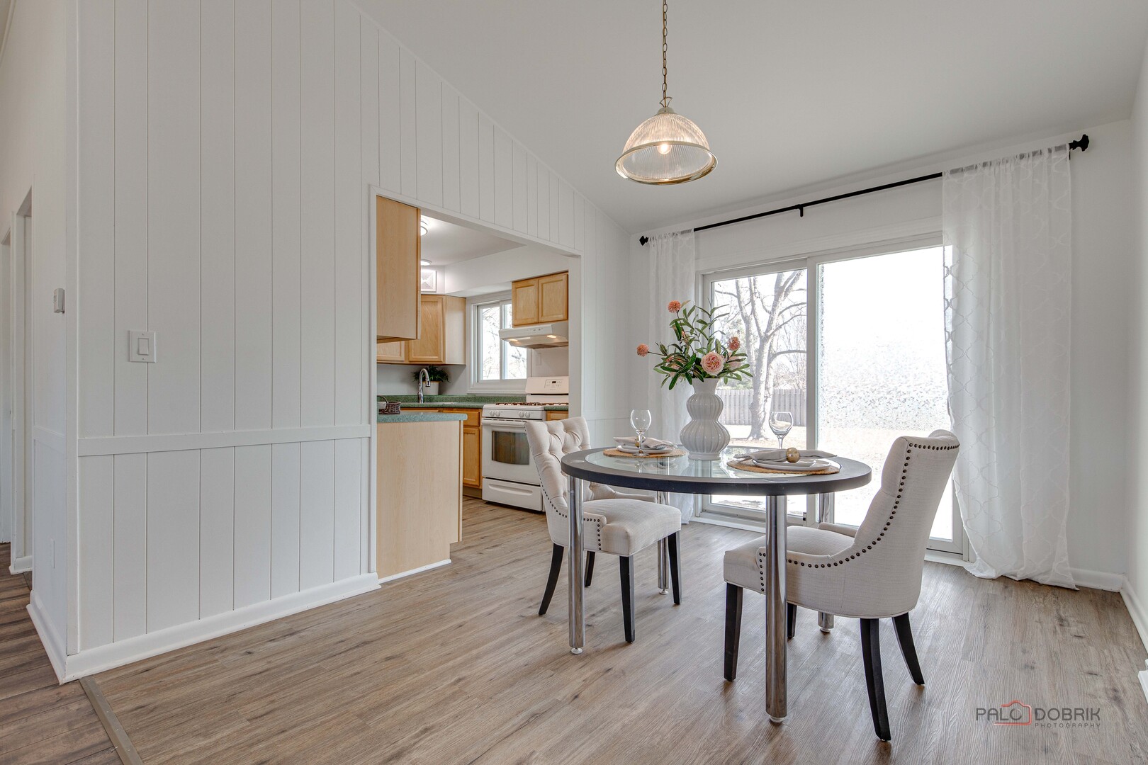 73 South Beck Road Lindenhurst, IL 60046 - Photo 4 of 23 a view of a dining room with furniture window and wooden floor