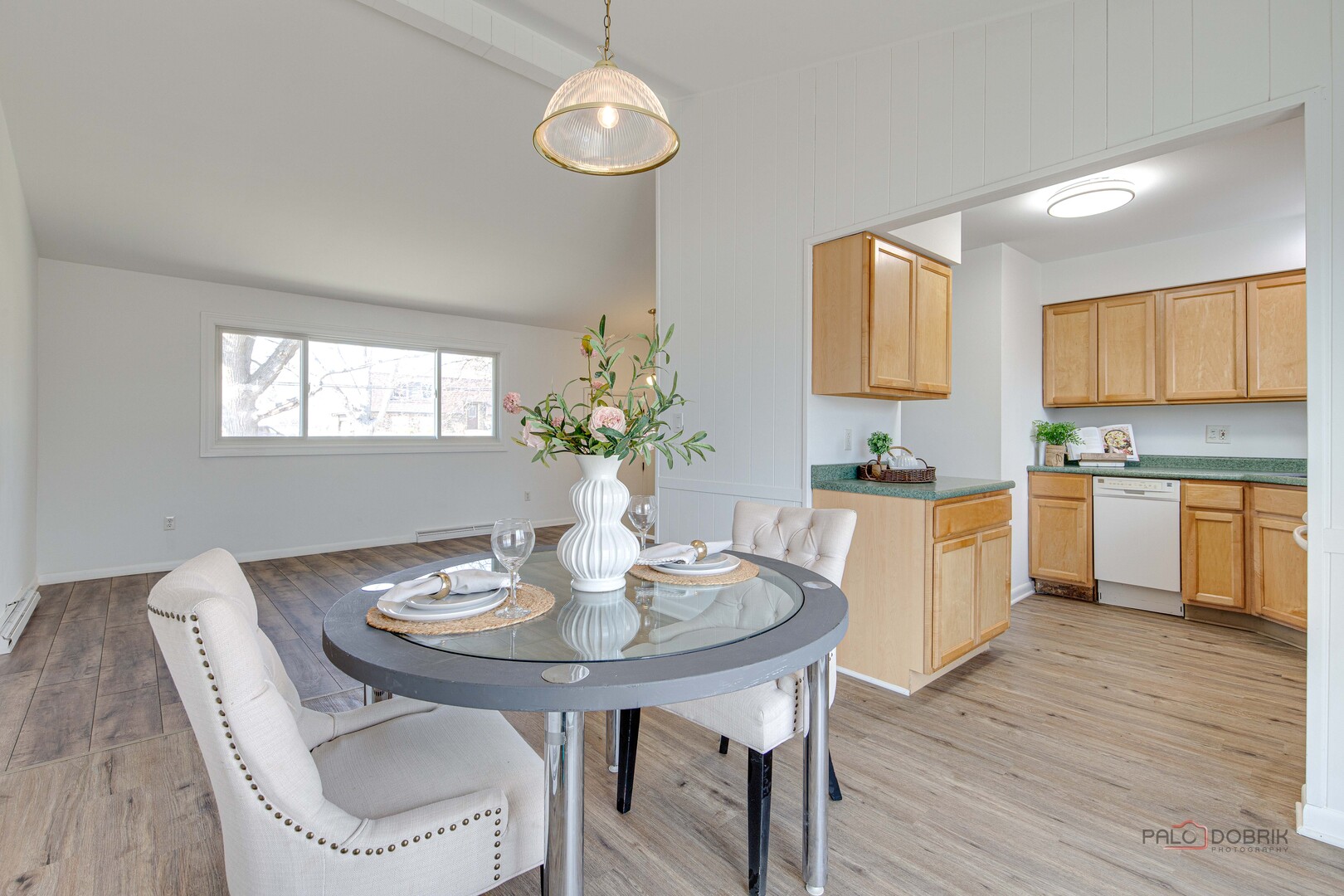 73 South Beck Road Lindenhurst, IL 60046 - Photo 6 of 23 a kitchen with a table and chairs in it