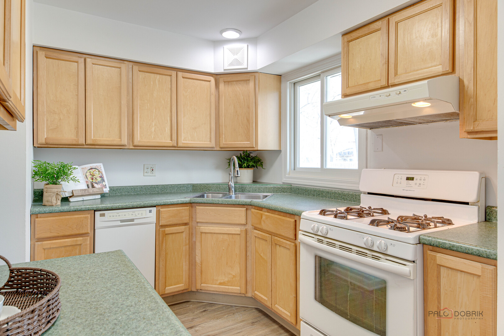 73 South Beck Road Lindenhurst, IL 60046 - Photo 7 of 23 a kitchen with granite countertop cabinets stainless steel appliances and a counter space