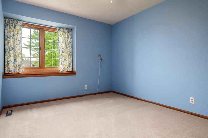 8833 West Ridge Drive Belvidere, IL 61008 - Photo 55 of 65 an empty room with a window