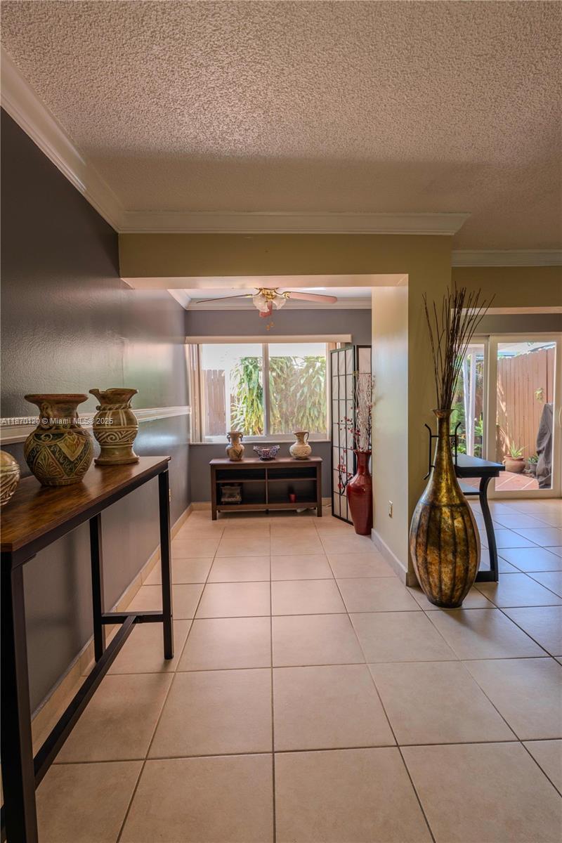2435 Southwest 11th Street, Unit 9B Miami, FL 33135 - Photo 15 of 33 a lobby with furniture and floor to ceiling window