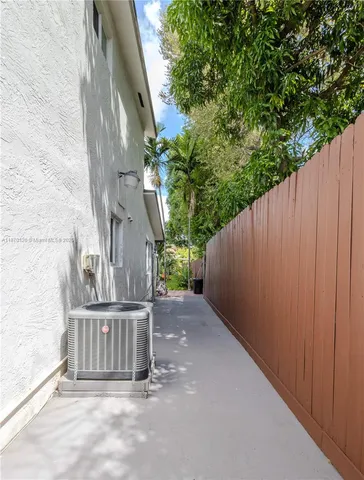 a view of a wooden fence