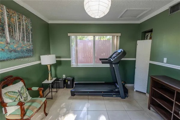 a room with furniture and a window