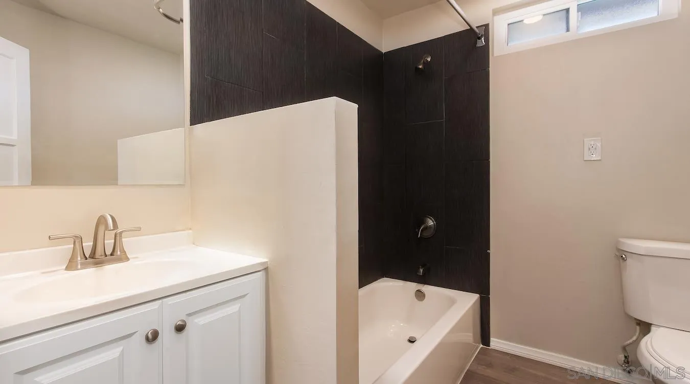 238 E Street Chula Vista, CA 91910 - Photo 12 of 15 a bathroom with a sink and a mirror