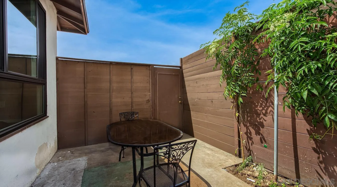 238 E Street Chula Vista, CA 91910 - Photo 13 of 15 a backyard of a house with table and chairs