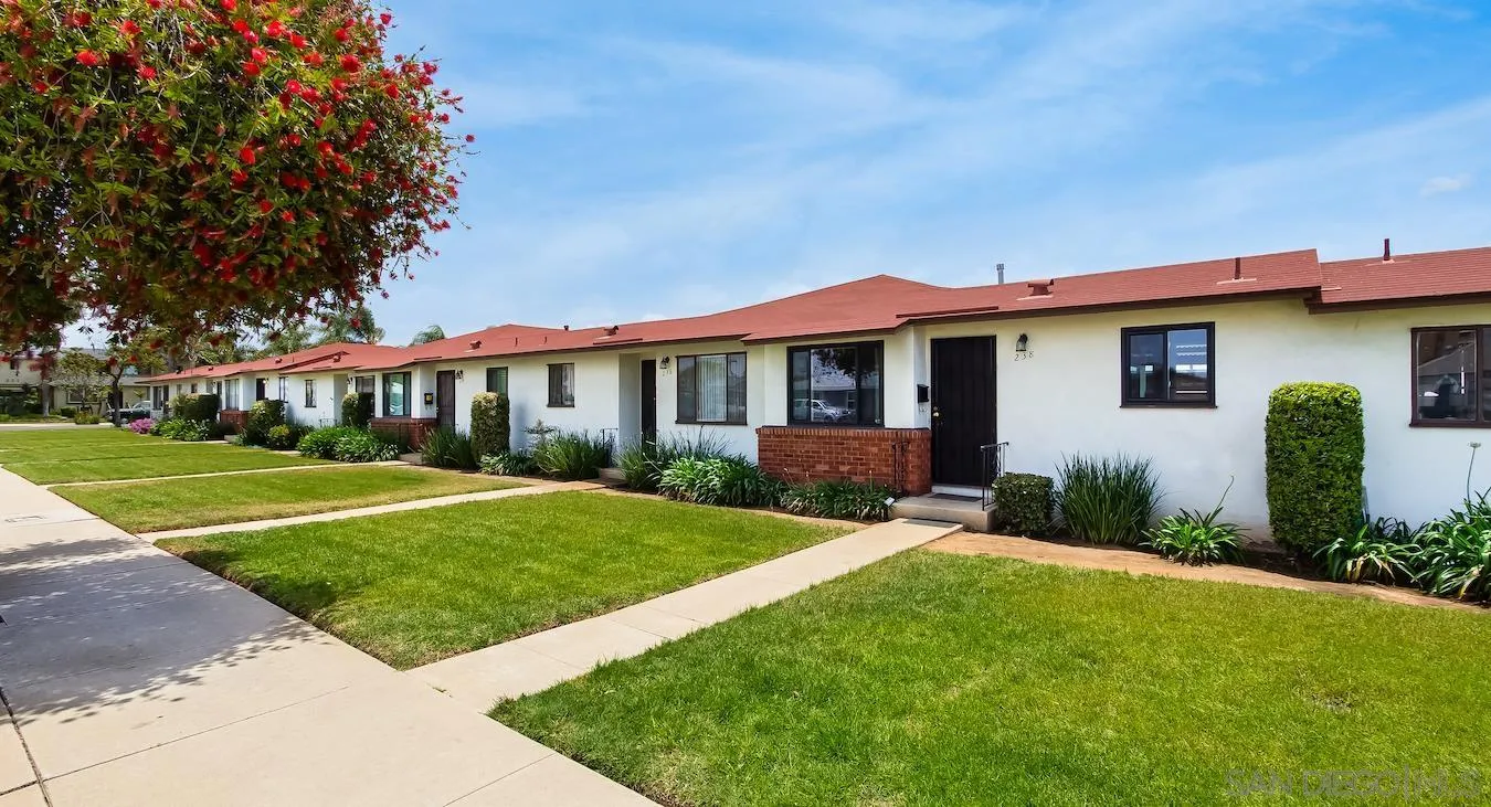 238 E Street Chula Vista, CA 91910 - Photo 3 of 15 a front view of a house with garden