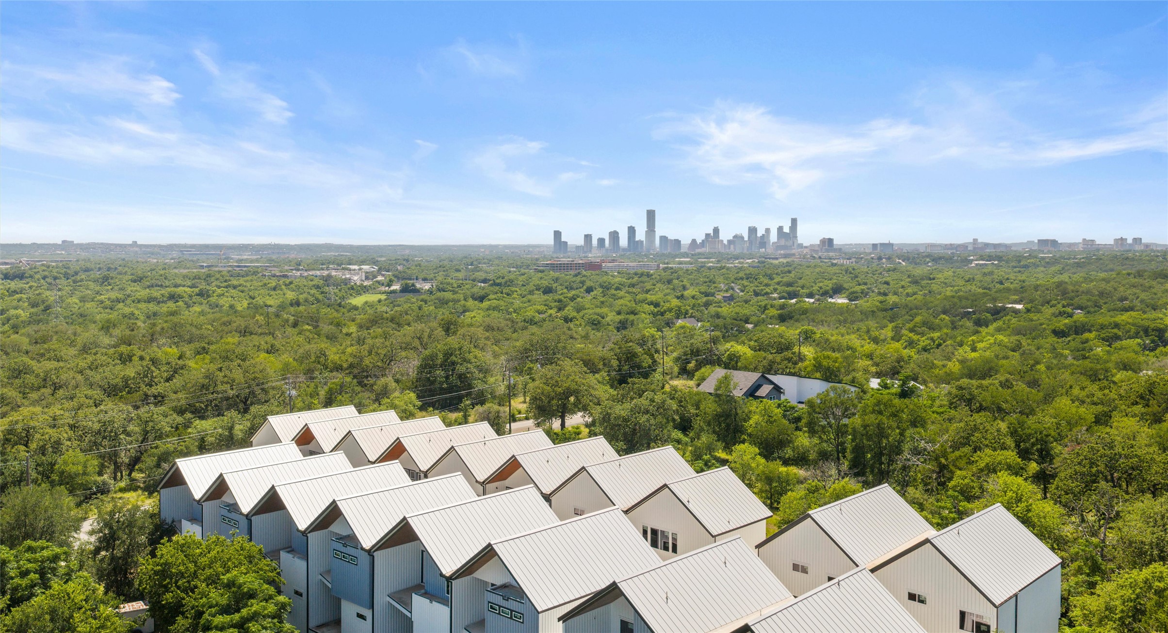 5912 Harold Court, Unit 107 Austin, TX 78721 - Photo 17 of 35 A neighborhood view showing the community's easy connection to East Austin and the wider city. Model No. 105 Shown.