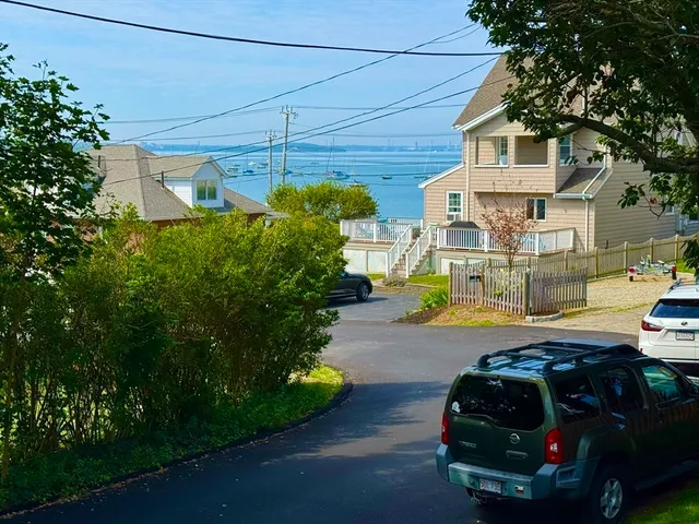 a car parked in front of a house