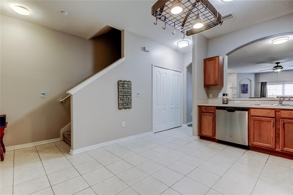 1138 Hillhurst Drive Wesley Chapel, FL 33543 - Photo 21 of 65 a view of a kitchen with a sink and chandelier