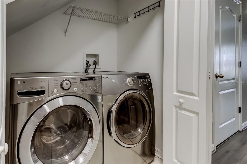 1138 Hillhurst Drive Wesley Chapel, FL 33543 - Photo 23 of 65 a utility room with dryer and washer