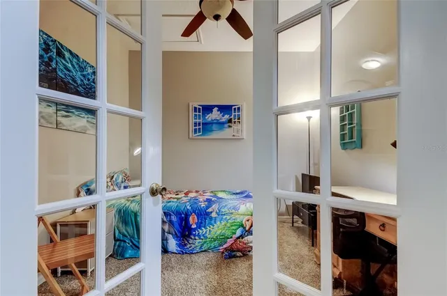 a bedroom with a bed and a dresser