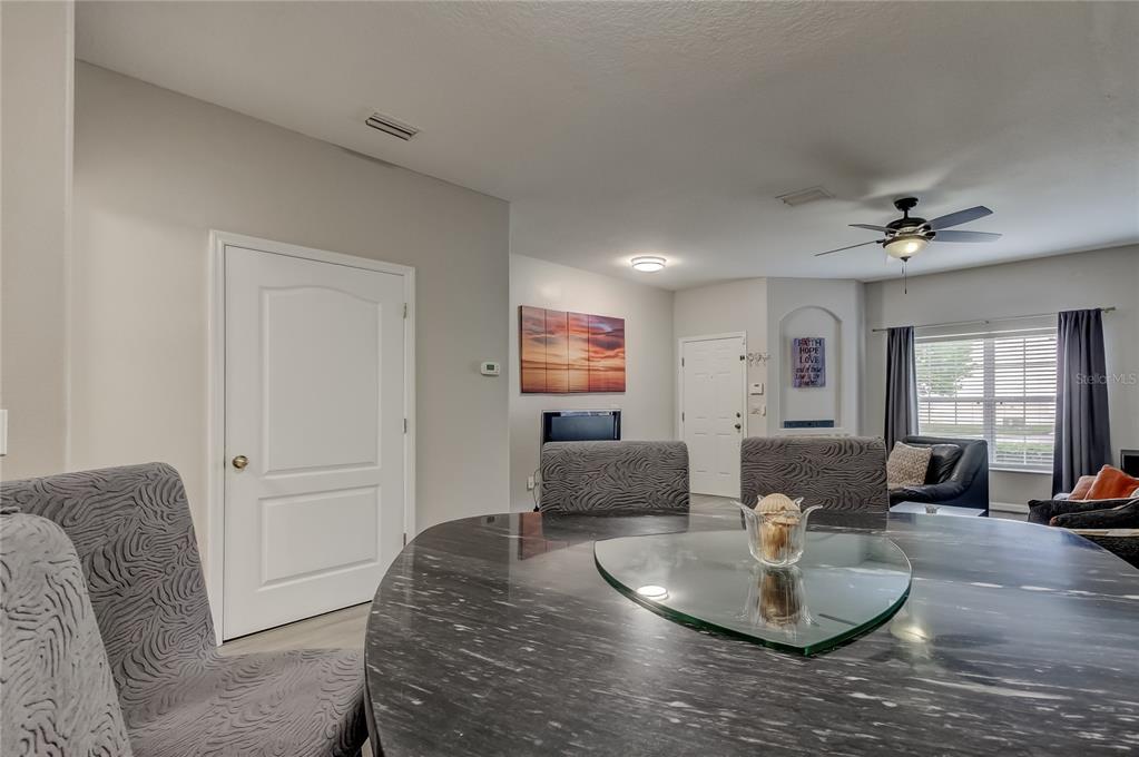 1138 Hillhurst Drive Wesley Chapel, FL 33543 - Photo 10 of 65 a living room with furniture and wooden floor