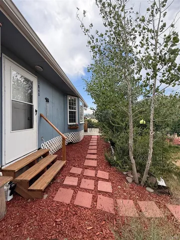 a house with trees in front of it