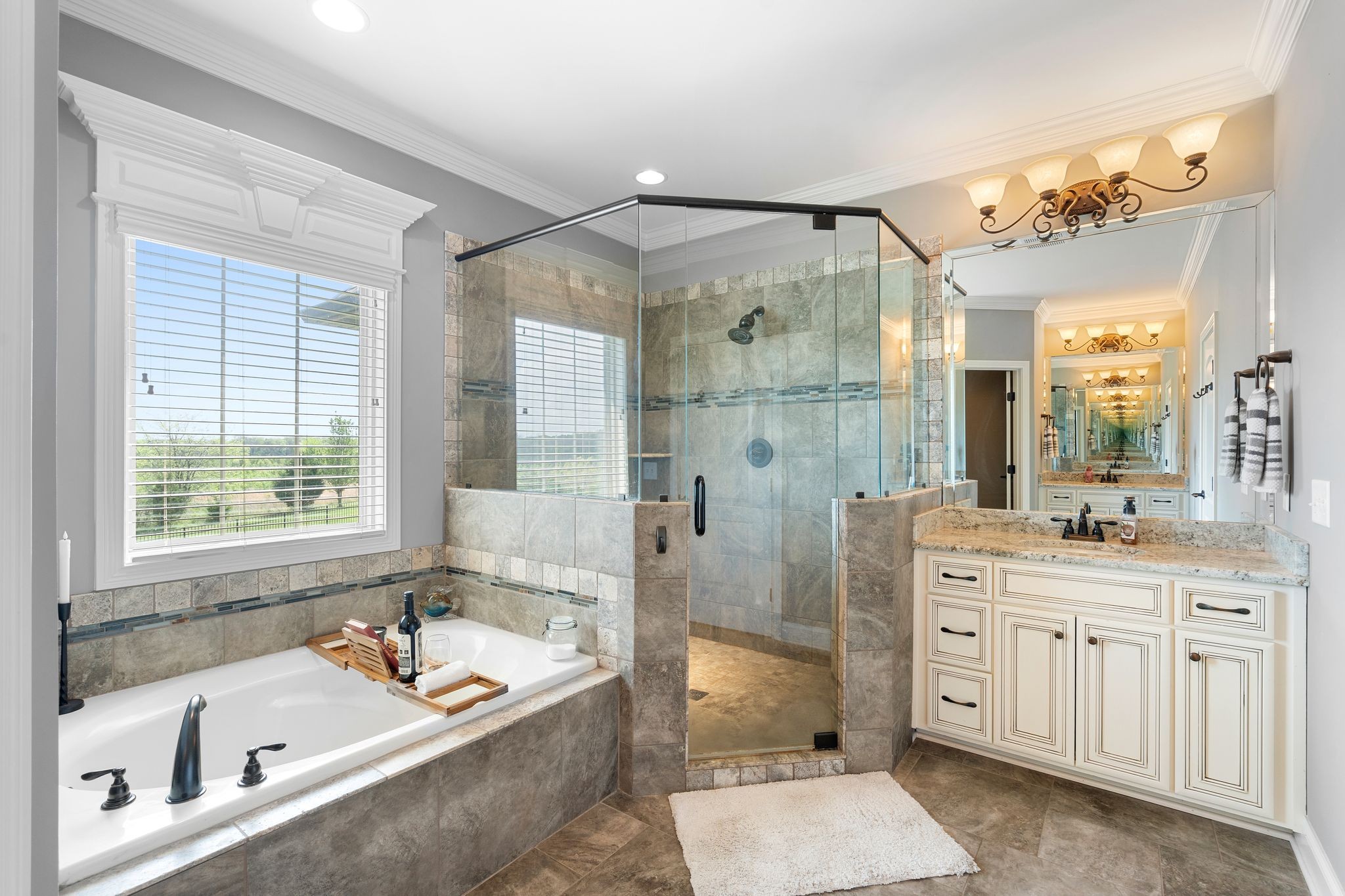1013 Mires Road Mount Juliet, TN 37122 - Photo 23 of 50 a bathroom with a tub sink shower and mirror