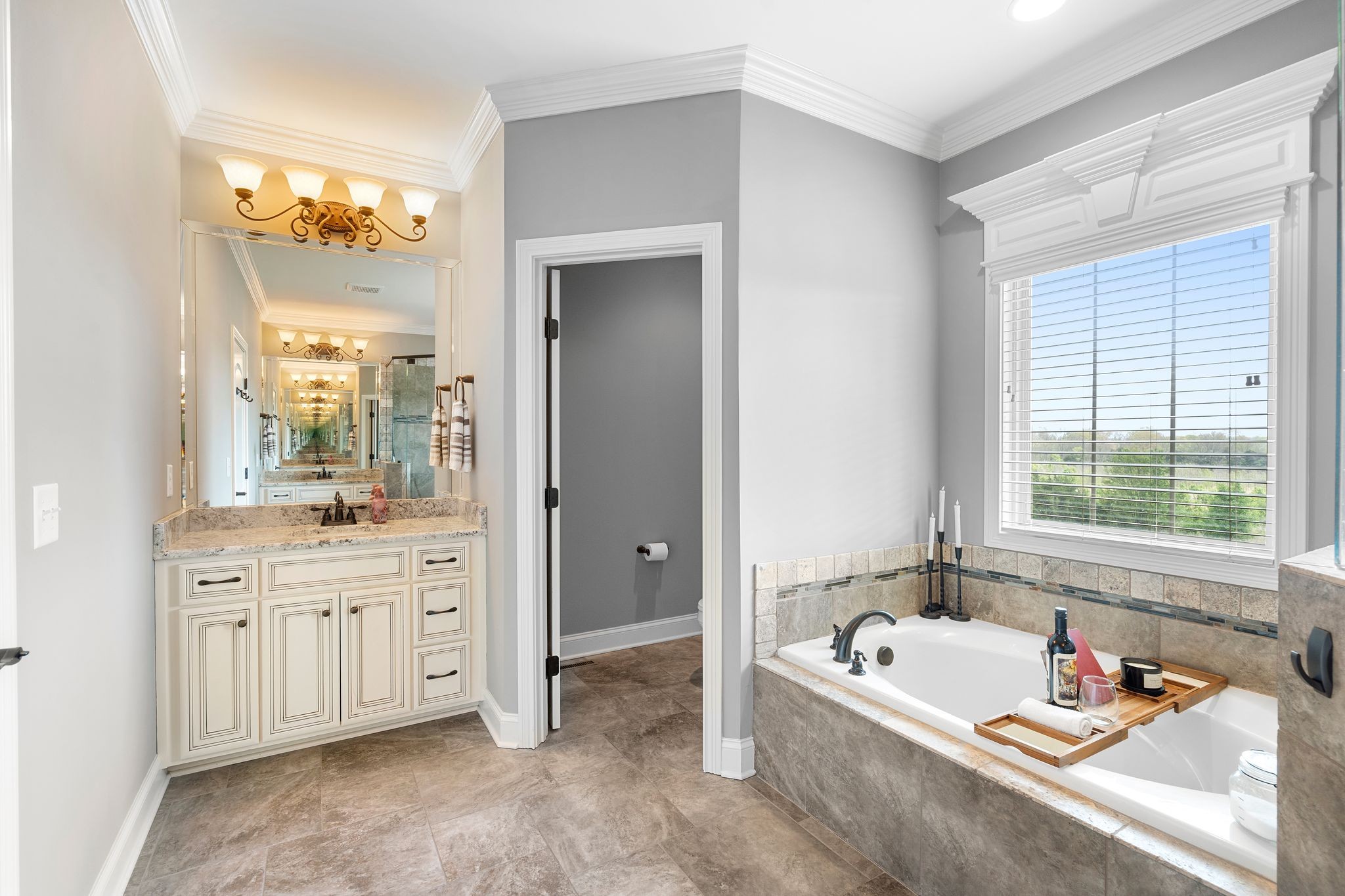 1013 Mires Road Mount Juliet, TN 37122 - Photo 24 of 50 a bathroom with a tub sink and mirror