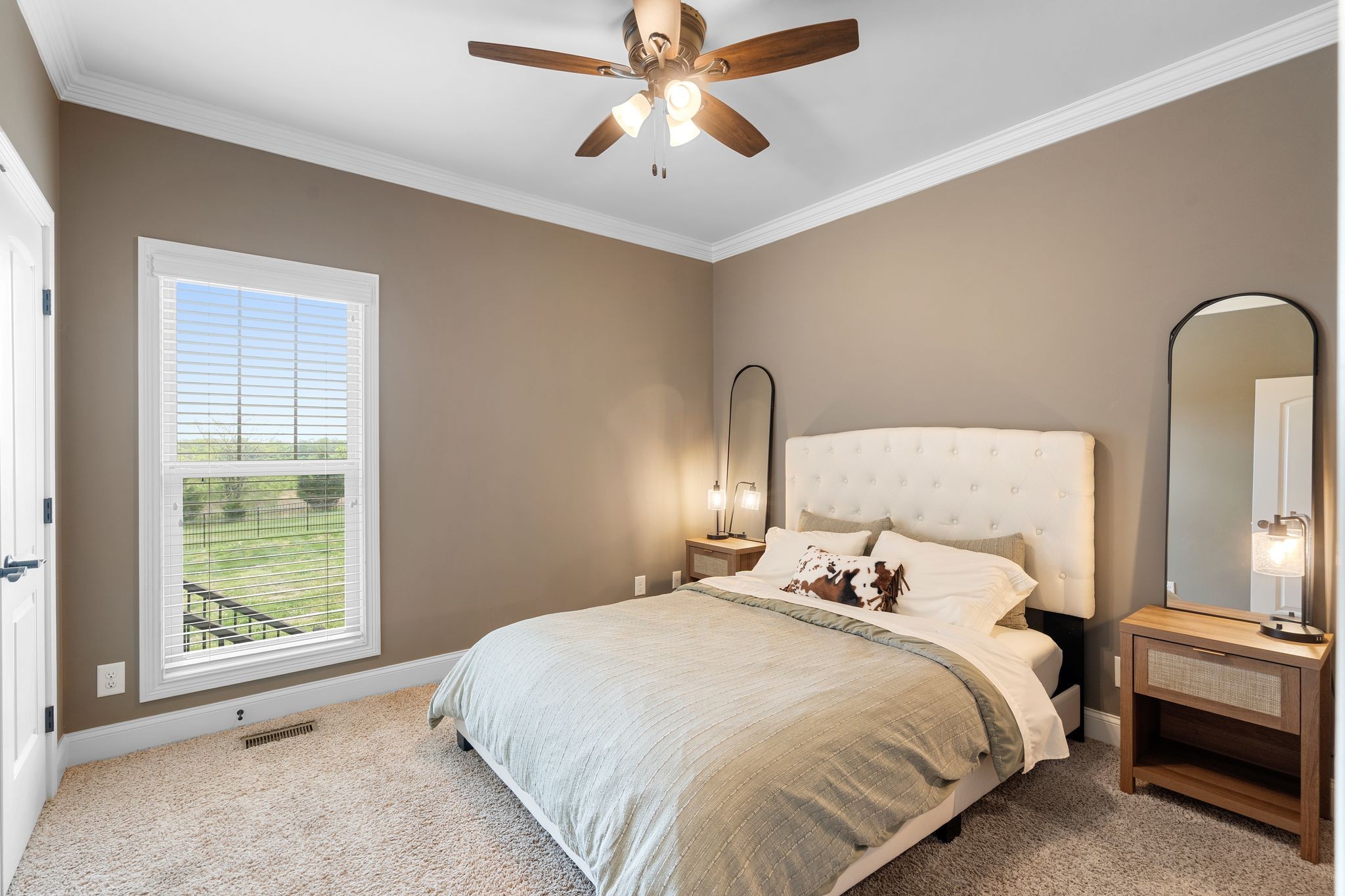 1013 Mires Road Mount Juliet, TN 37122 - Photo 27 of 50 a bedroom with a bed and a chandelier