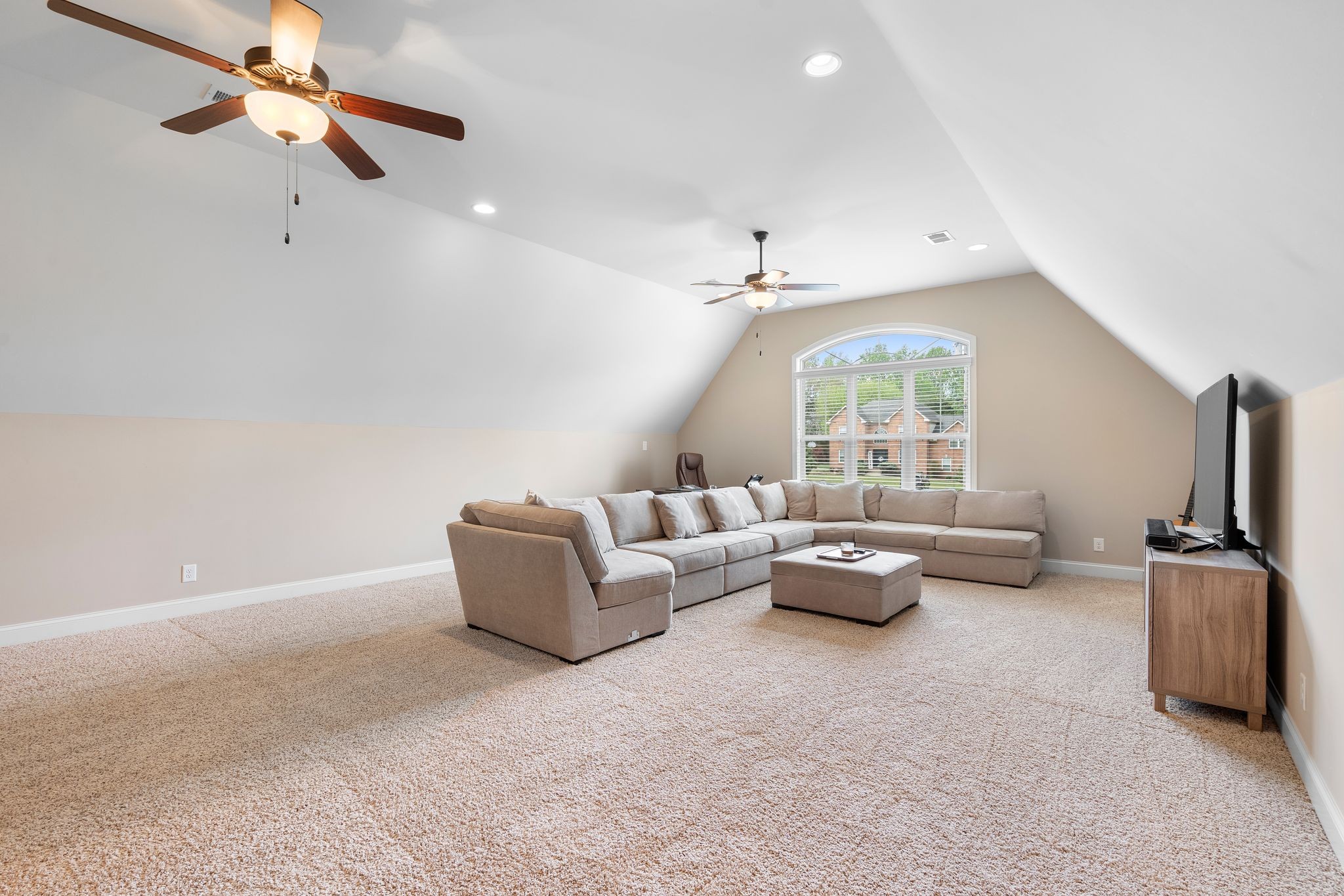 1013 Mires Road Mount Juliet, TN 37122 - Photo 30 of 50 a living room with furniture and a flat screen tv
