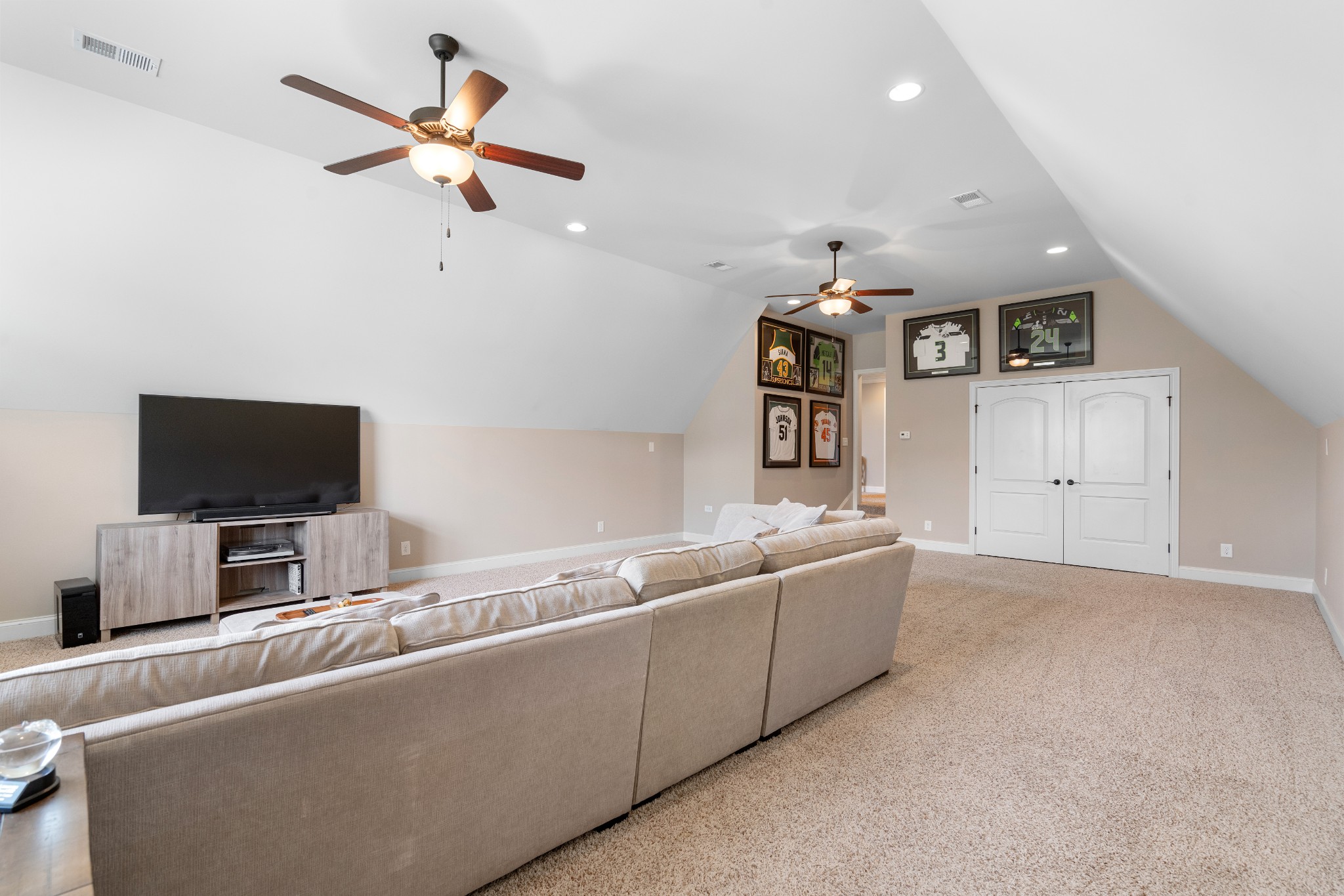 1013 Mires Road Mount Juliet, TN 37122 - Photo 31 of 50 a living room with a couch and a flat screen tv