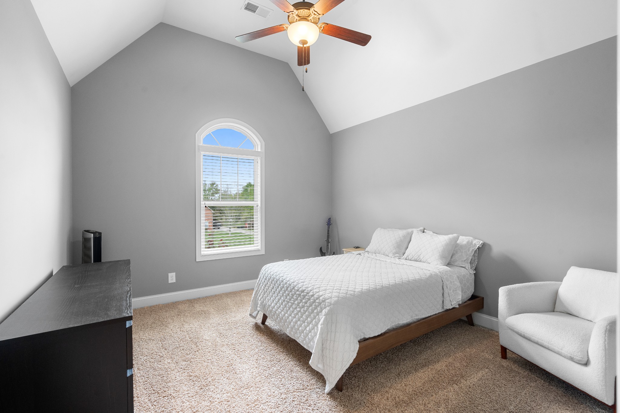 1013 Mires Road Mount Juliet, TN 37122 - Photo 32 of 50 a bedroom with a bed and a chandelier