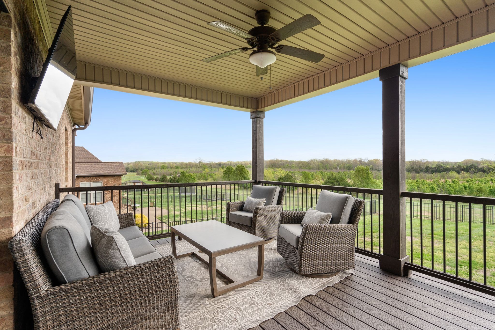 1013 Mires Road Mount Juliet, TN 37122 - Photo 36 of 50 a balcony with wooden floor and outdoor seating