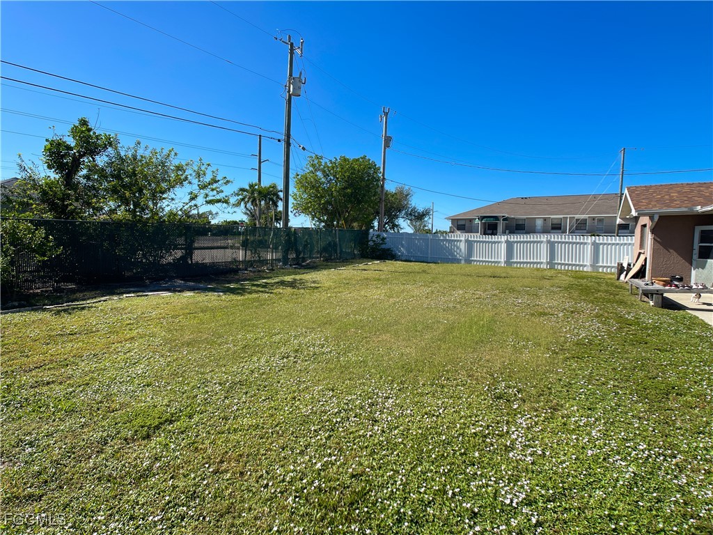 1156 Southwest 47th Terrace Cape Coral, FL 33914 - Photo 10 of 13 a view of a garden