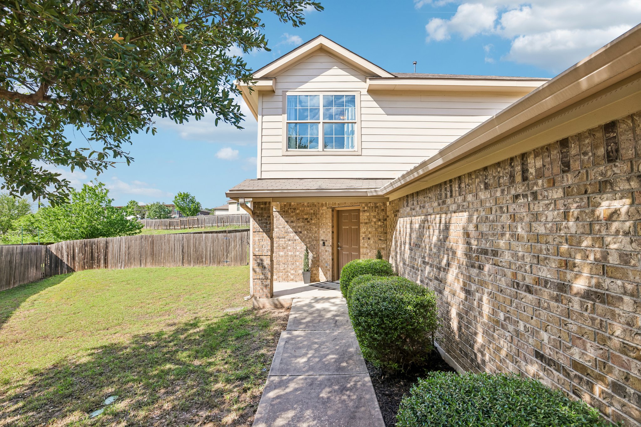 5508 Emma Thompson Way Austin, TX 78747 - Photo 7 of 34 A welcoming entry sets the tone, featuring a charming covered front porch that adds warmth and curb appeal.