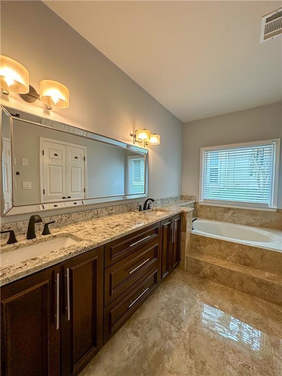 3255 Park Chase Alpharetta, GA 30022 - Photo 13 of 27 a bathroom with a granite countertop double vanity sink and a large mirror