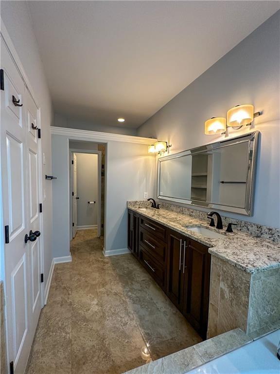 3255 Park Chase Alpharetta, GA 30022 - Photo 14 of 27 a bathroom with a granite countertop sink and a mirror