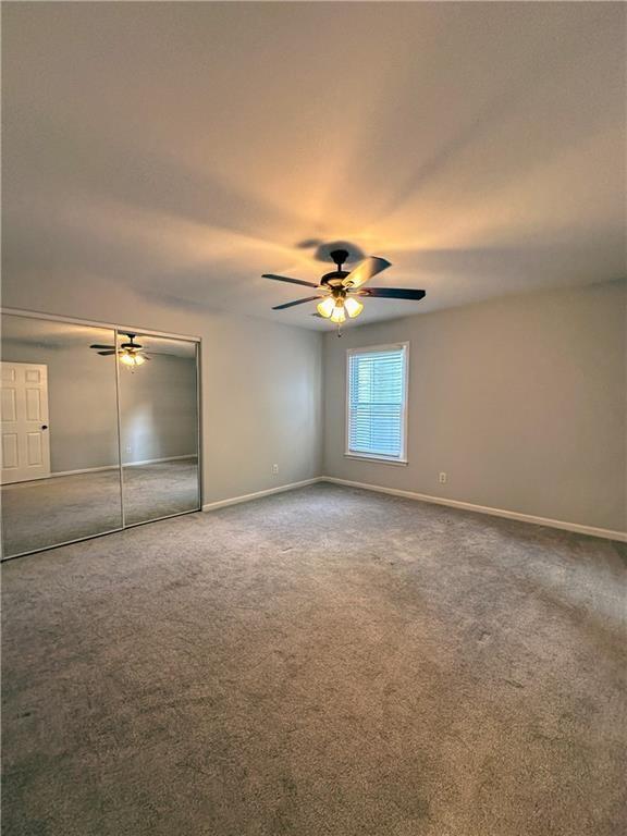 3255 Park Chase Alpharetta, GA 30022 - Photo 21 of 27 a view of a livingroom with a ceiling fan and chandelier fan