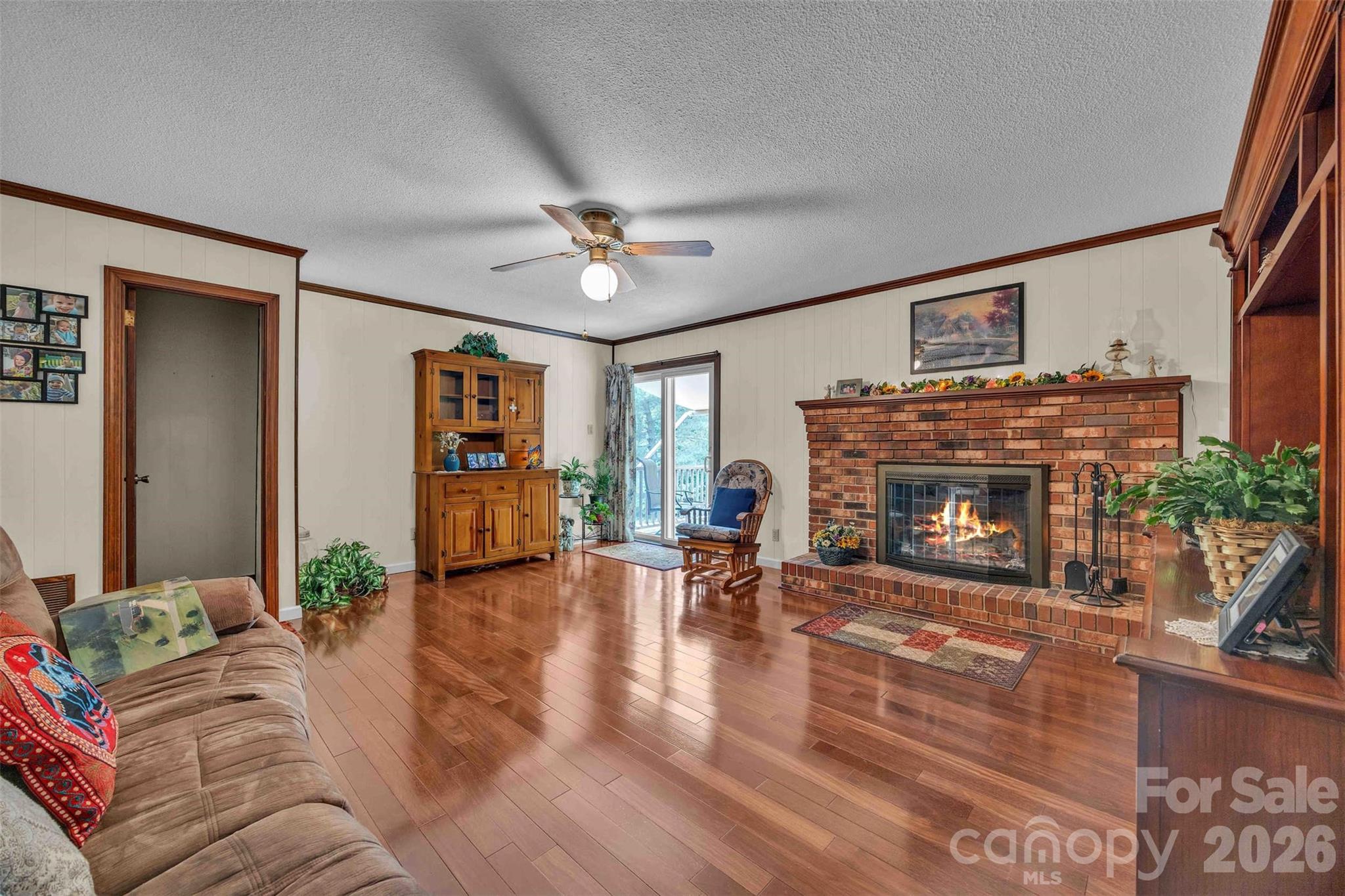 137 Proust Road Statesville, NC 28625 - Photo 16 of 47 a living room with furniture and a fireplace