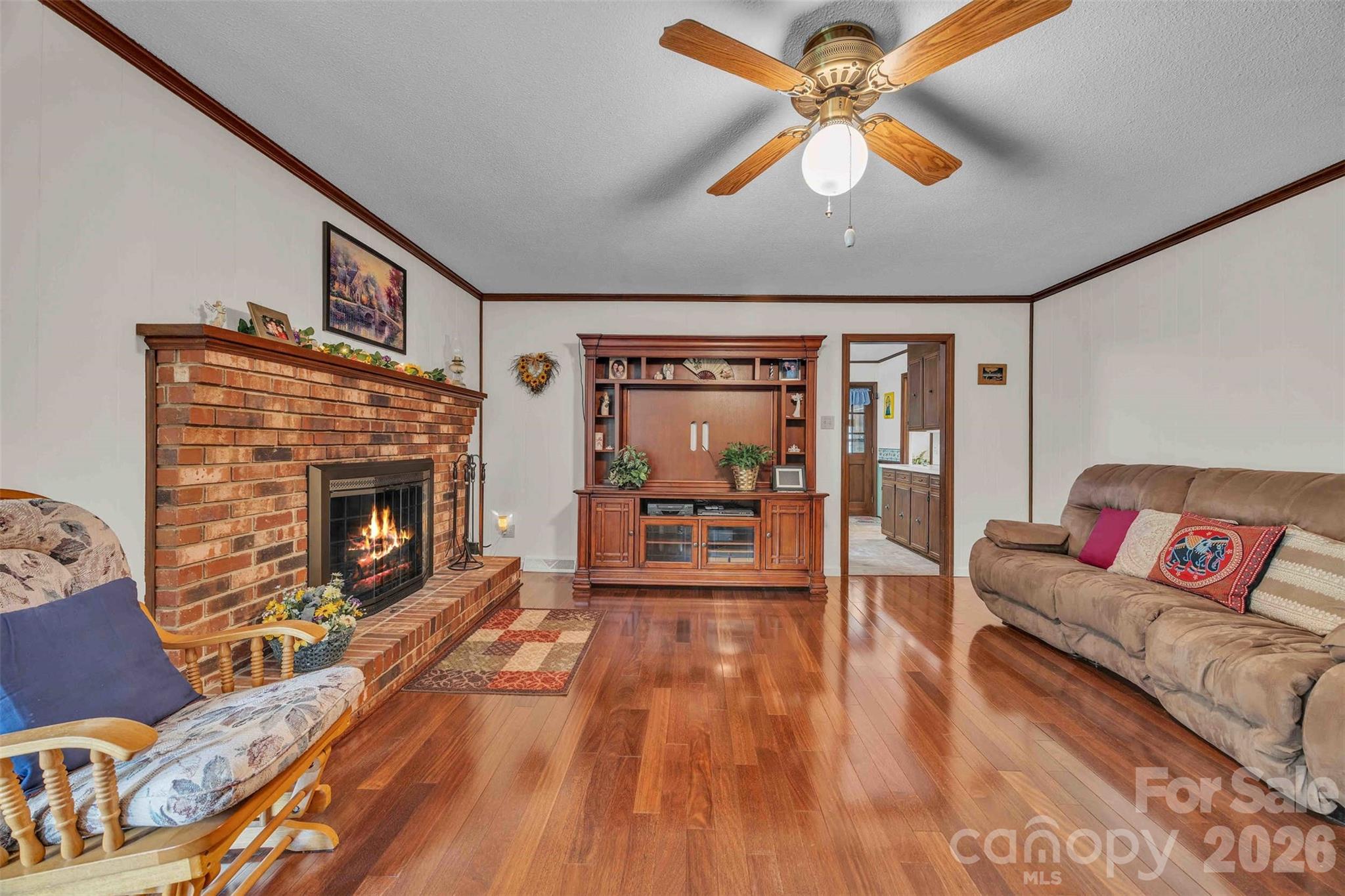 137 Proust Road Statesville, NC 28625 - Photo 17 of 47 a living room with furniture and a fireplace