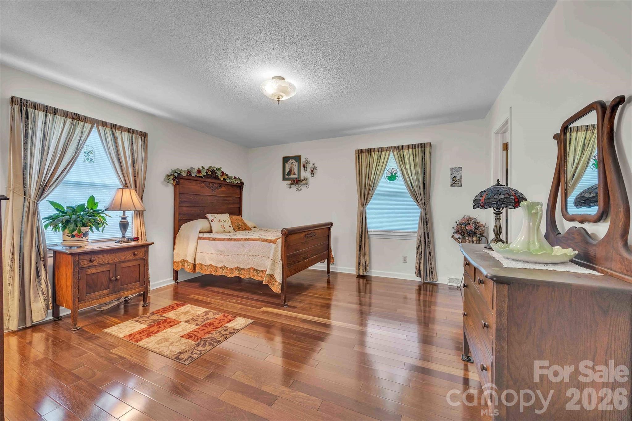 137 Proust Road Statesville, NC 28625 - Photo 26 of 47 a bedroom with furniture and a window