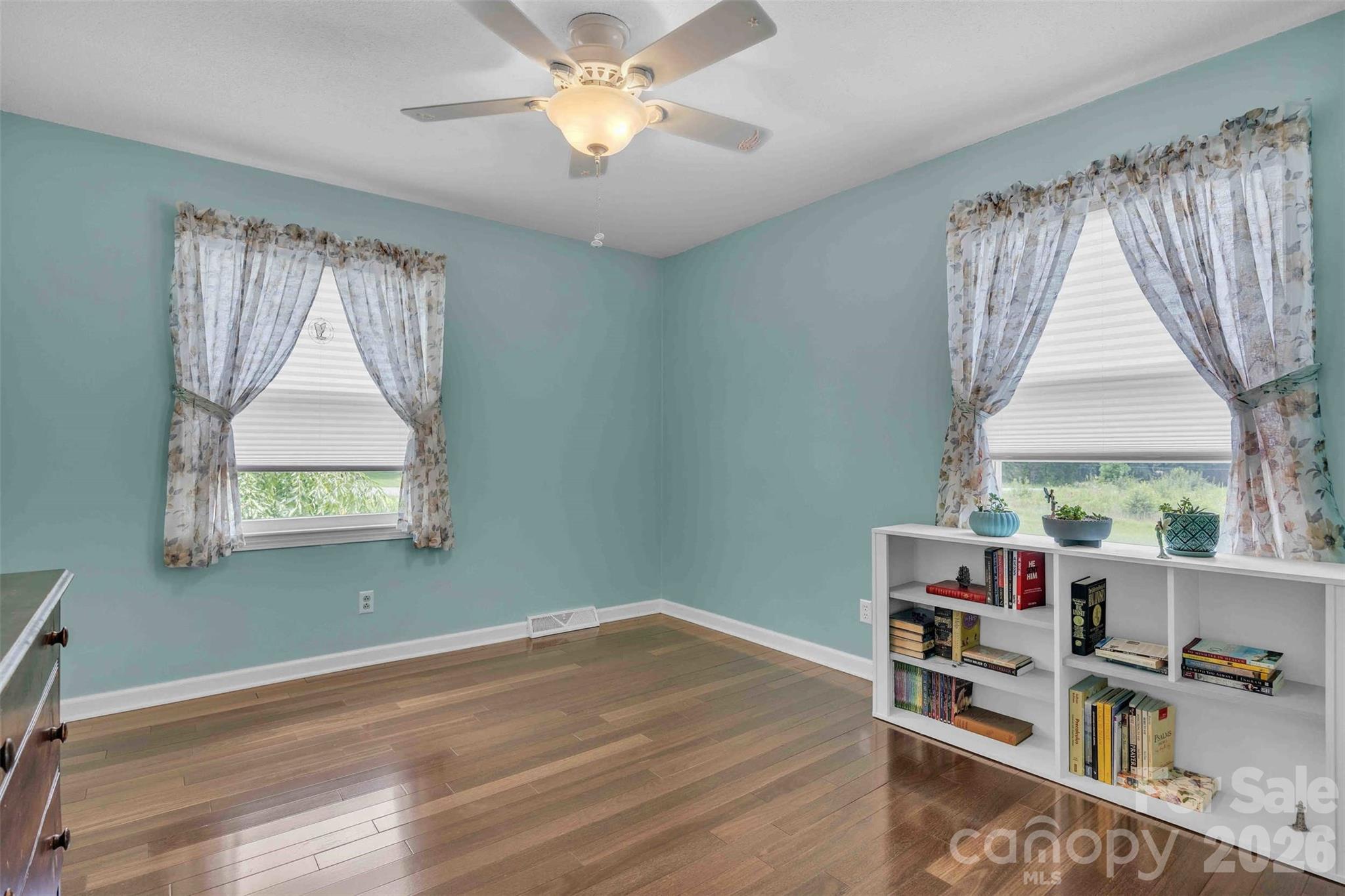 137 Proust Road Statesville, NC 28625 - Photo 32 of 47 wooden floor in an empty room with a window
